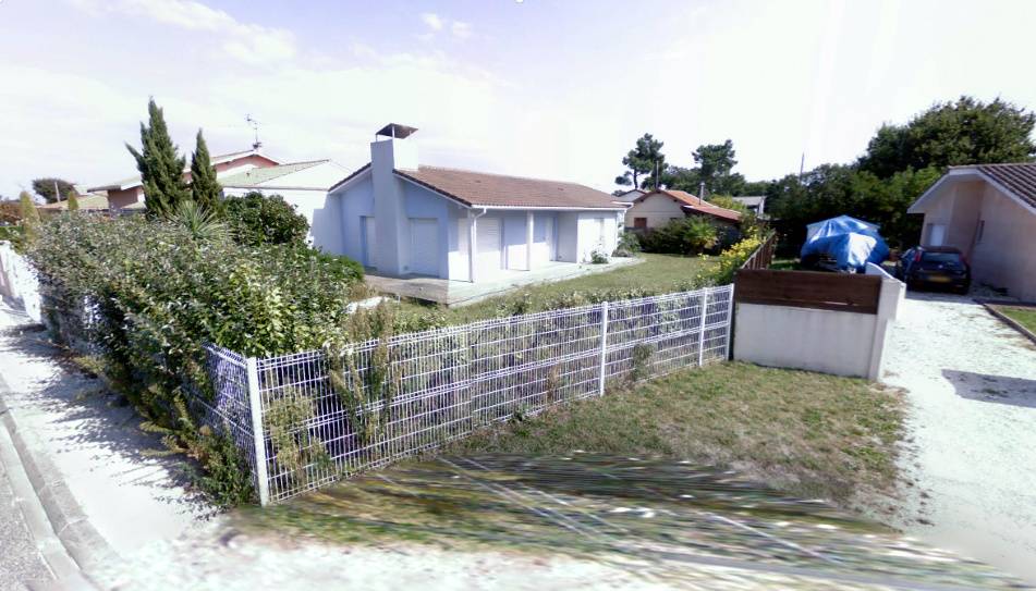 Maison existante avant la réalisation de la surélévation et la pose d'un bardage en volige couvre joint