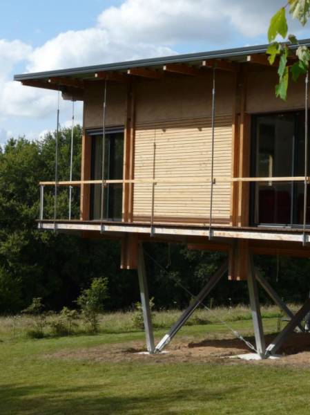 Maison Ossature Bois sur poteaux métalliques